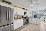 All stainless appliances, fully stocked kitchen
